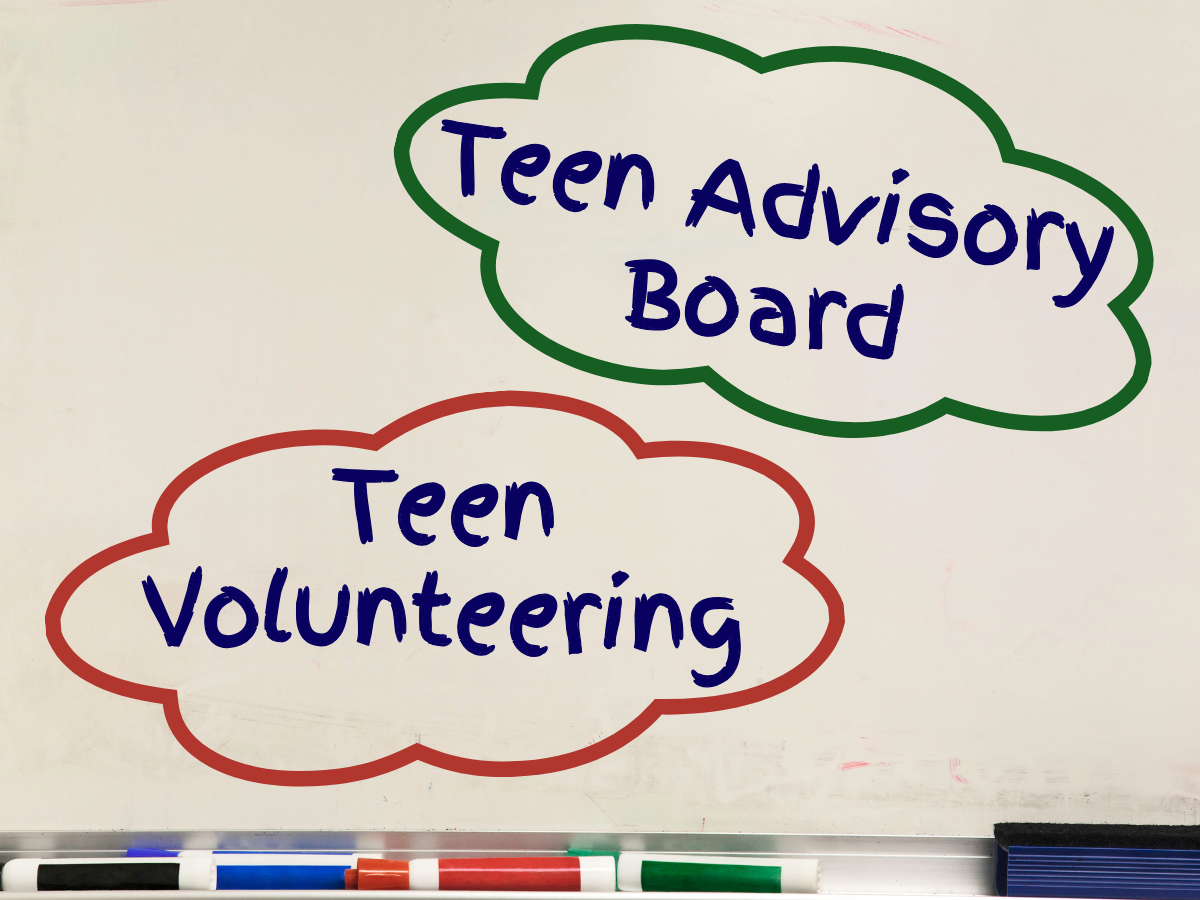 dry erase board with teen advisory board and teen volunteering written on it